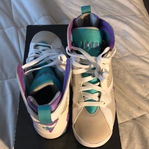 These are Girls Jordan retro (GS). Tan,purple,blue
